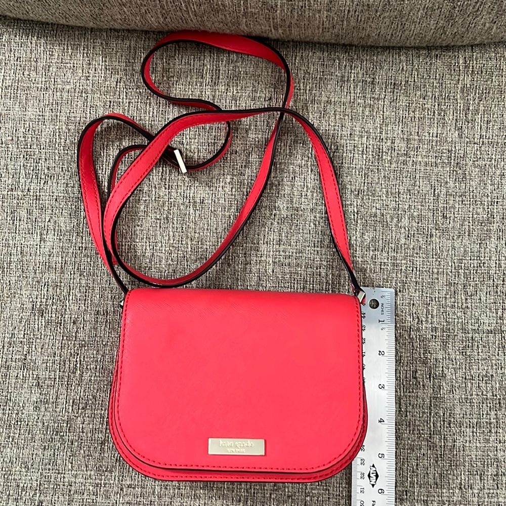 Brand new with tags Kate spade cross body/shoulder bag. Color- geranium